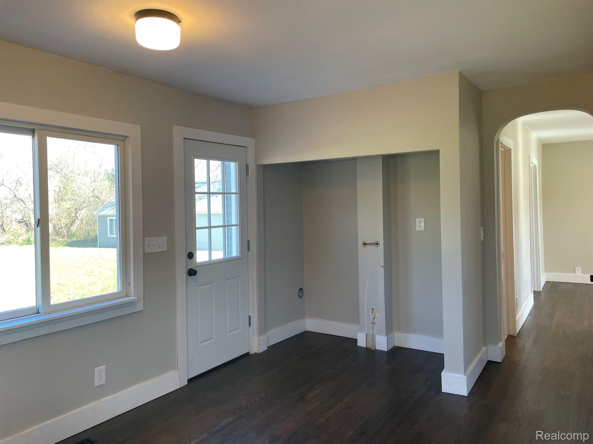 7273 Tucker Road Holly, MI 48442 - Photo 14 of 44 Kitchen Pantry & Back Door