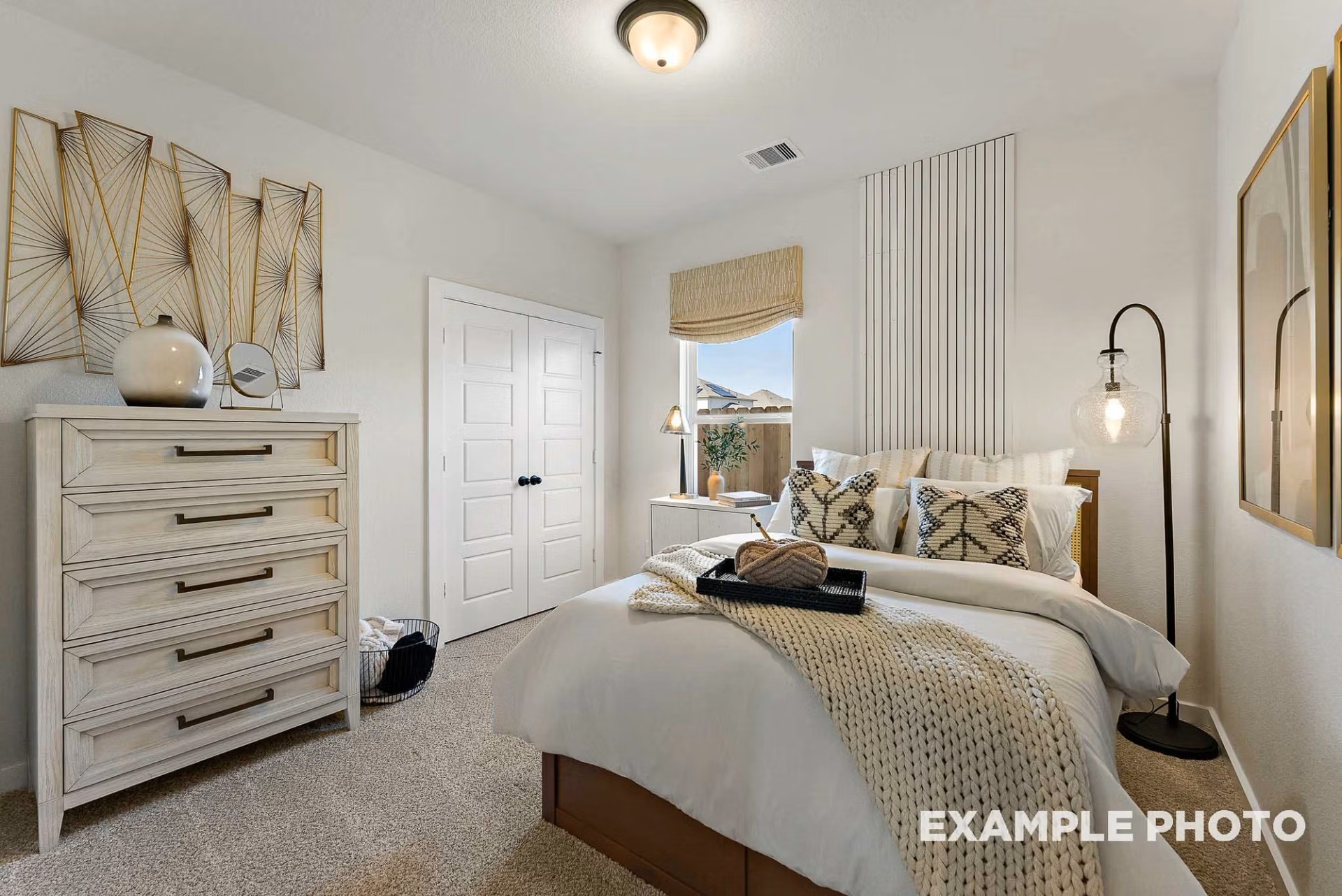 71 Leon Way Dayton, TX 77535 - Photo 17 of 25 a bedroom with a bed and a dresser
