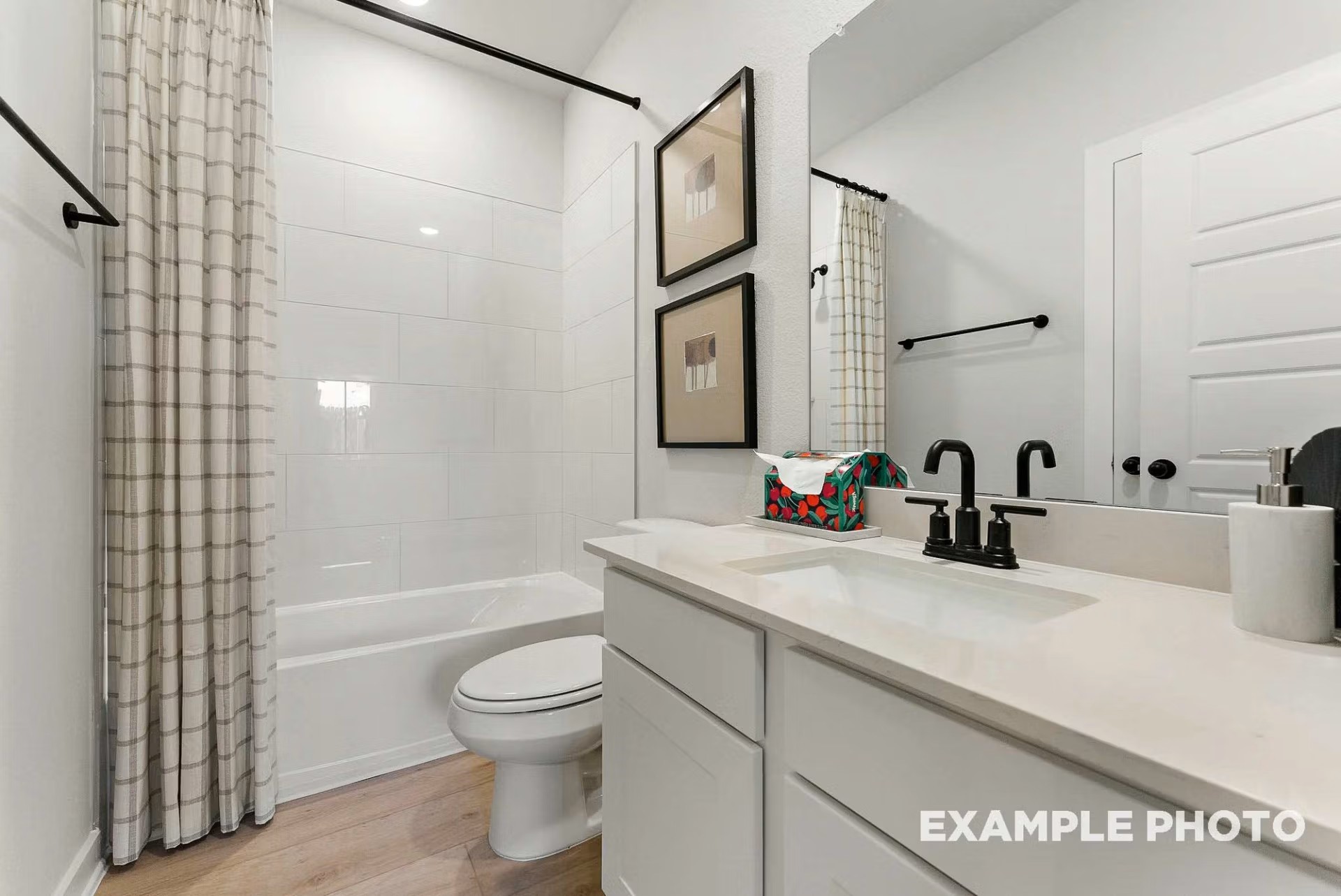 71 Leon Way Dayton, TX 77535 - Photo 20 of 25 a bathroom with a sink a toilet and shower
