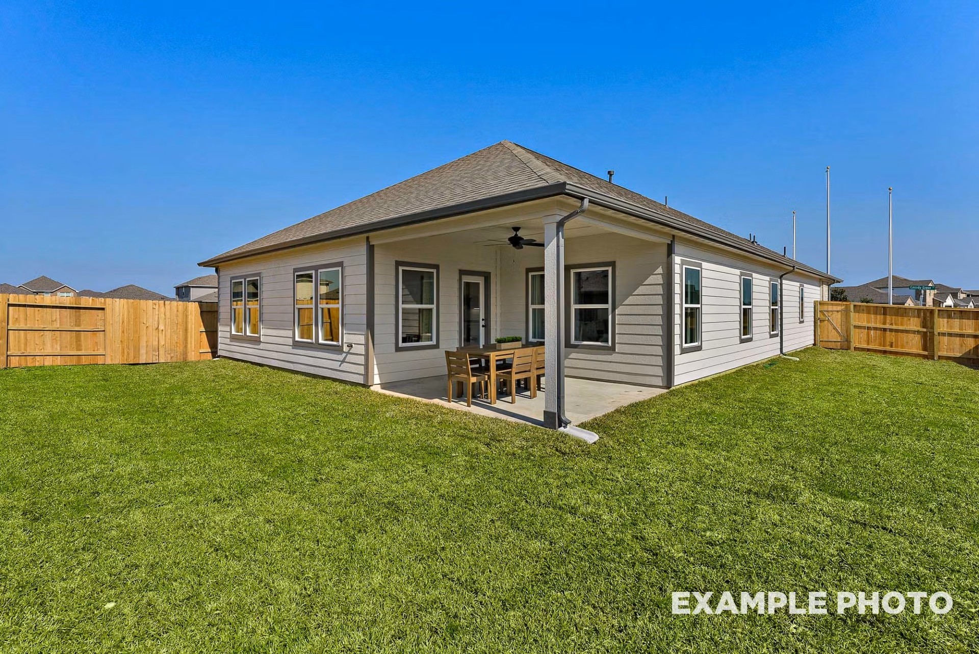 71 Leon Way Dayton, TX 77535 - Photo 24 of 25 a view of a house with backyard porch and garden