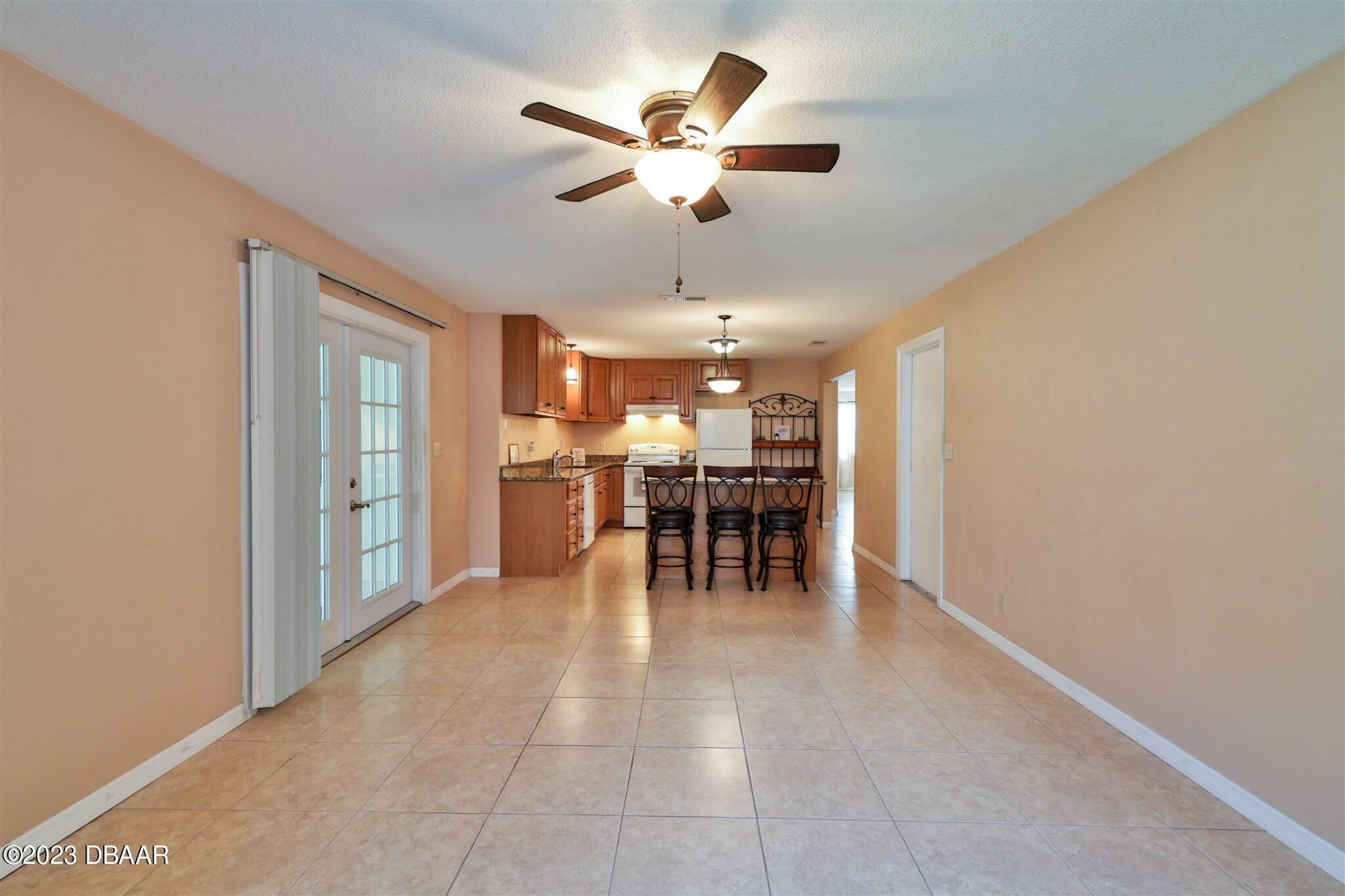 940 Northbrook Drive Ormond Beach, FL 32174 - Photo 14 of 28 a view of a dining room with furniture
