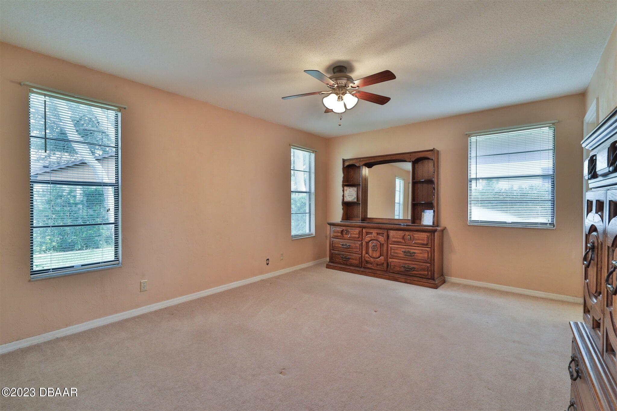 940 Northbrook Drive Ormond Beach, FL 32174 - Photo 15 of 28 a view of an empty room with a window
