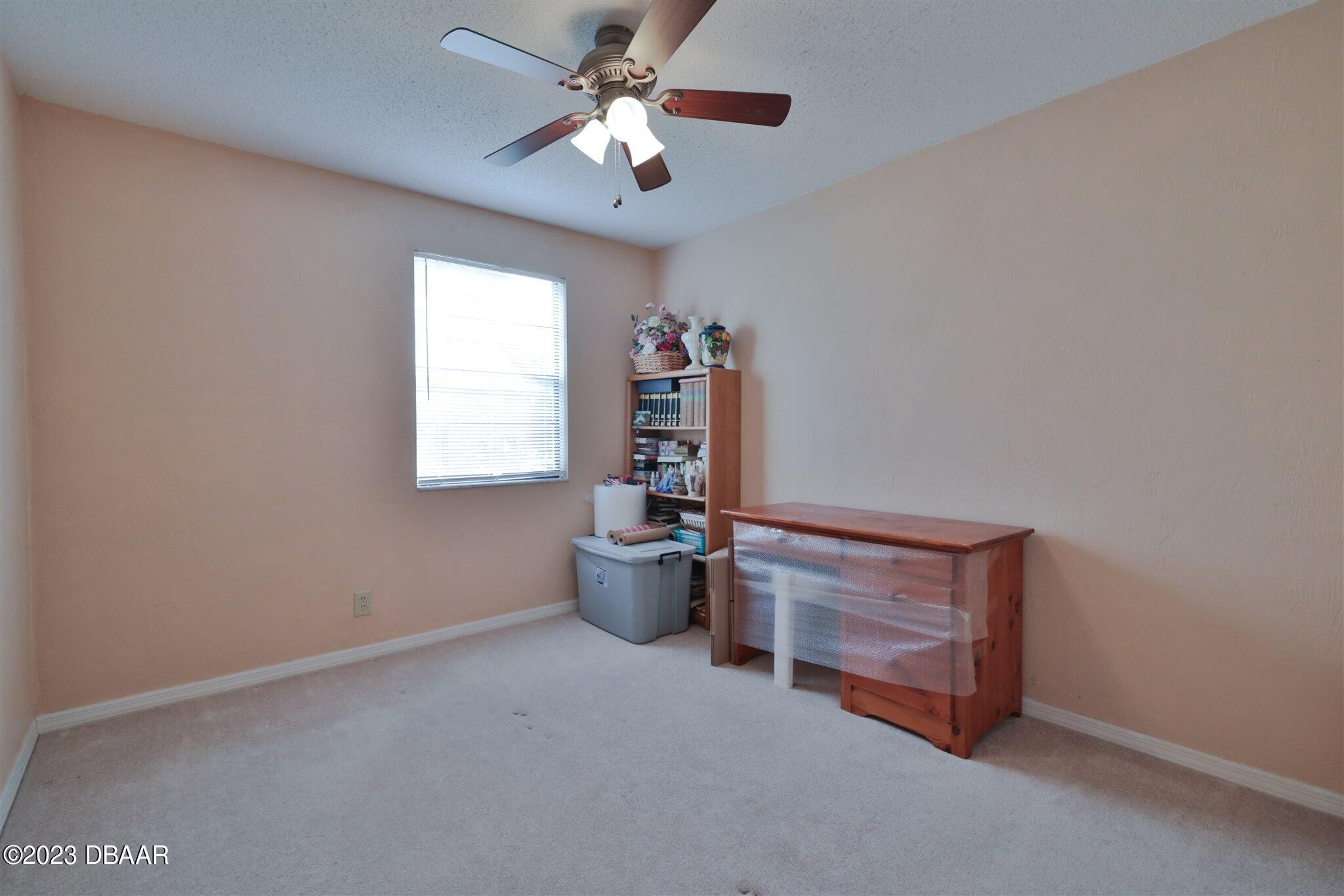 940 Northbrook Drive Ormond Beach, FL 32174 - Photo 21 of 28 a room with storage and utility