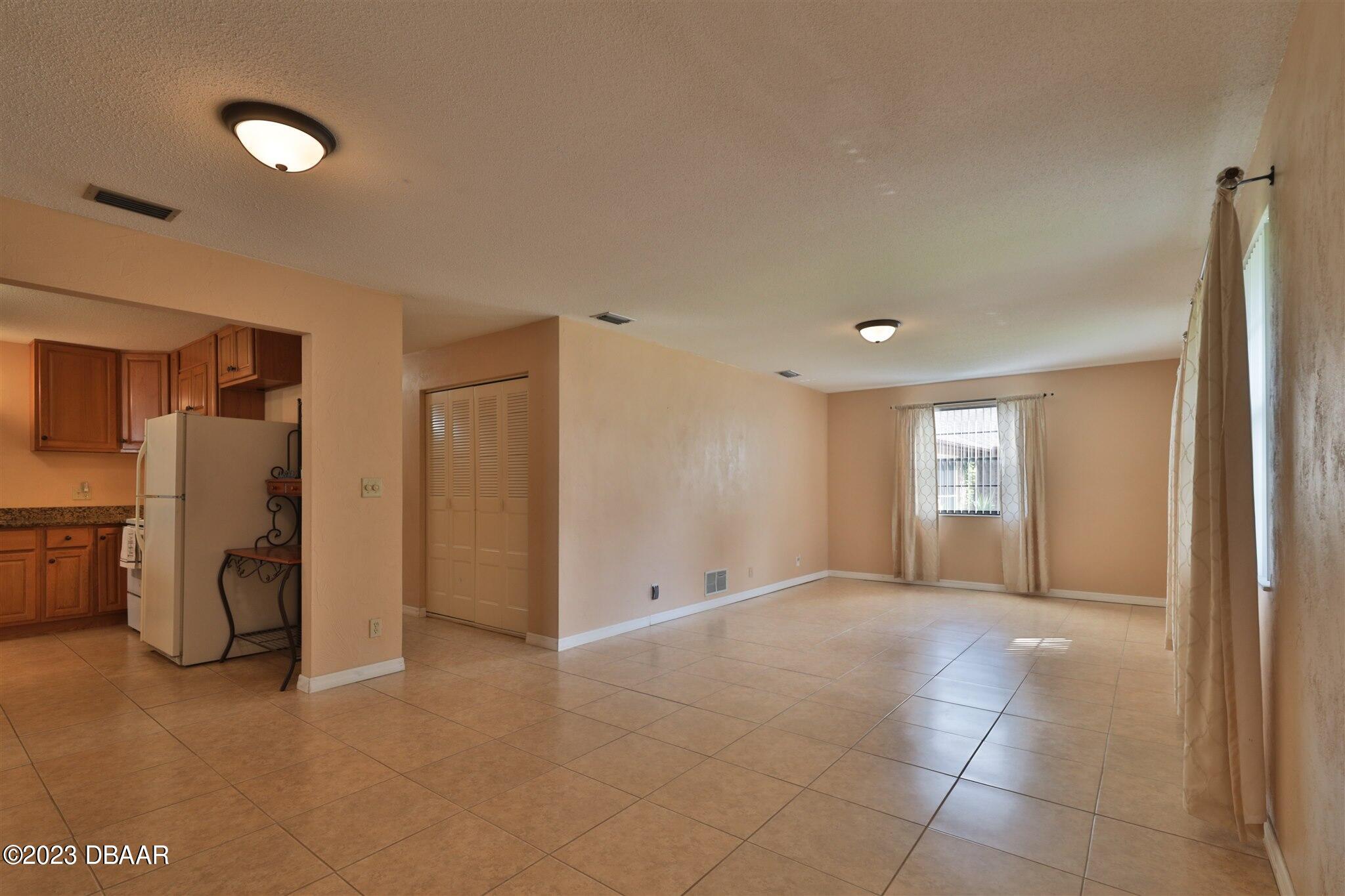 940 Northbrook Drive Ormond Beach, FL 32174 - Photo 5 of 28 a view of an empty room