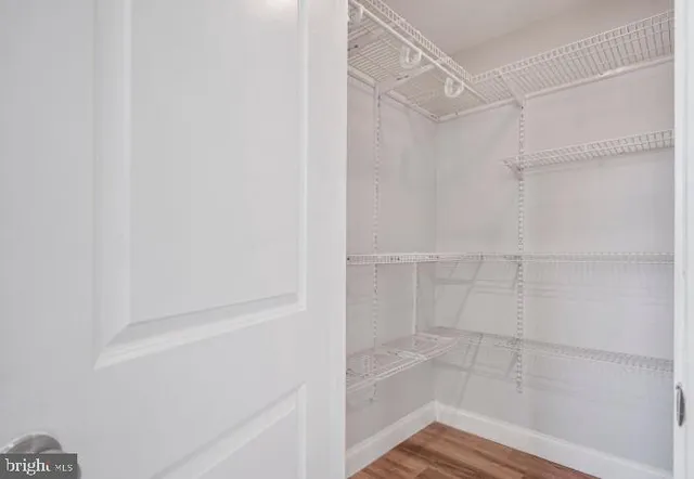 a empty closet with white paint