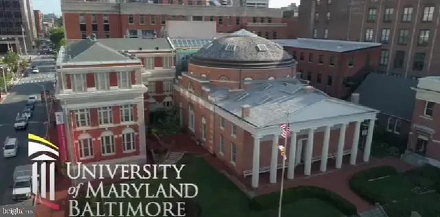a bathroom with a bathtub and a window