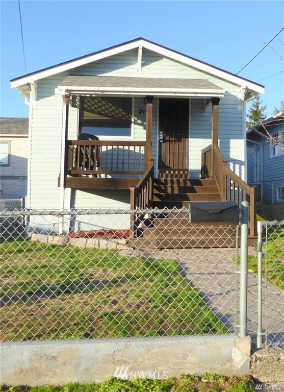 2124 7th Street Bremerton, WA 98312 - Photo 2 of 17 a front view of a house with garden