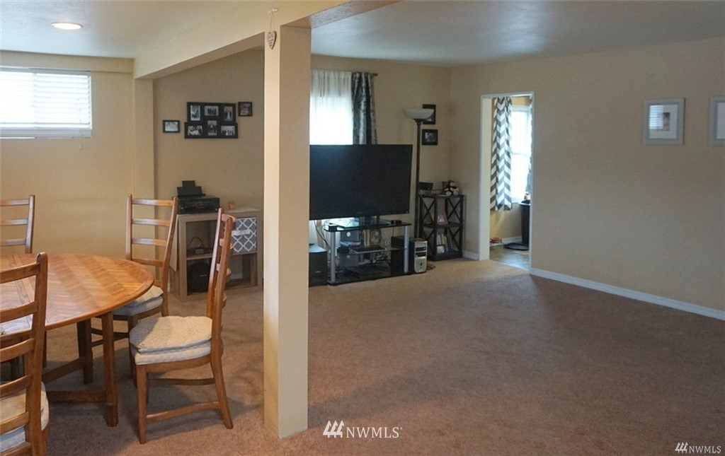 2124 7th Street Bremerton, WA 98312 - Photo 4 of 17 a living room with furniture and a flat screen tv