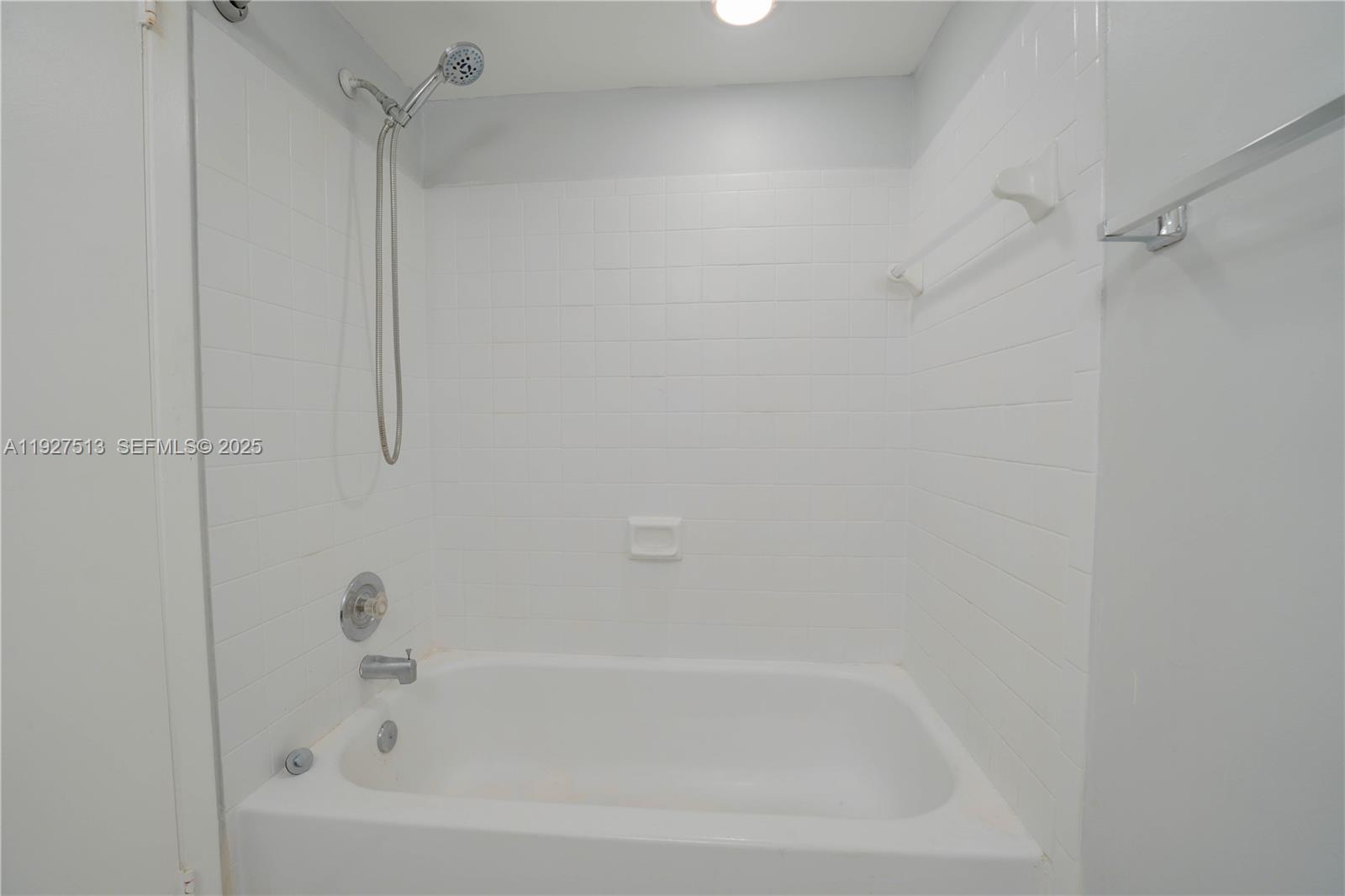5686 Rock Island Road, Unit 114 Tamarac, FL 33319 - Photo 10 of 32 a close view of a bathtub in bathroom