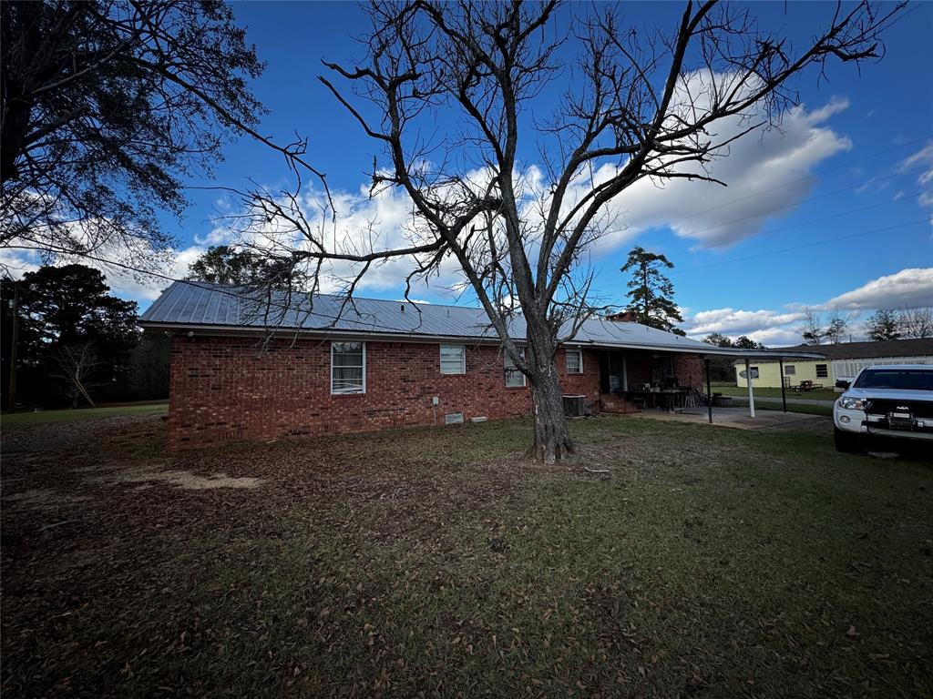 276 Hebron Road Lisbon, LA 71040 - Photo 8 of 15 a view of a house with a yard