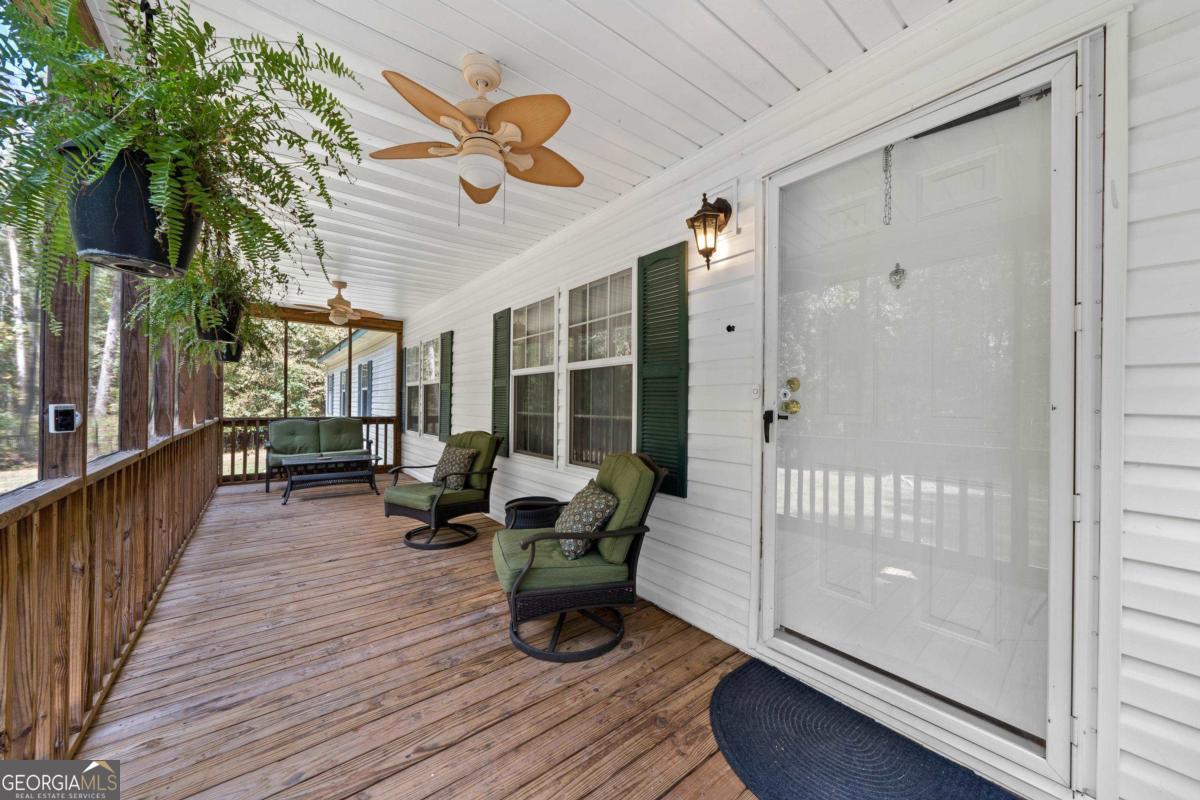 184 South Steel Bridge Road Eatonton, GA 31024 - Photo 1 of 1 a view of a balcony with chairs