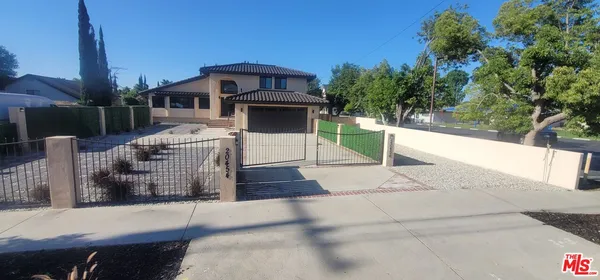 a front view of a house with a porch