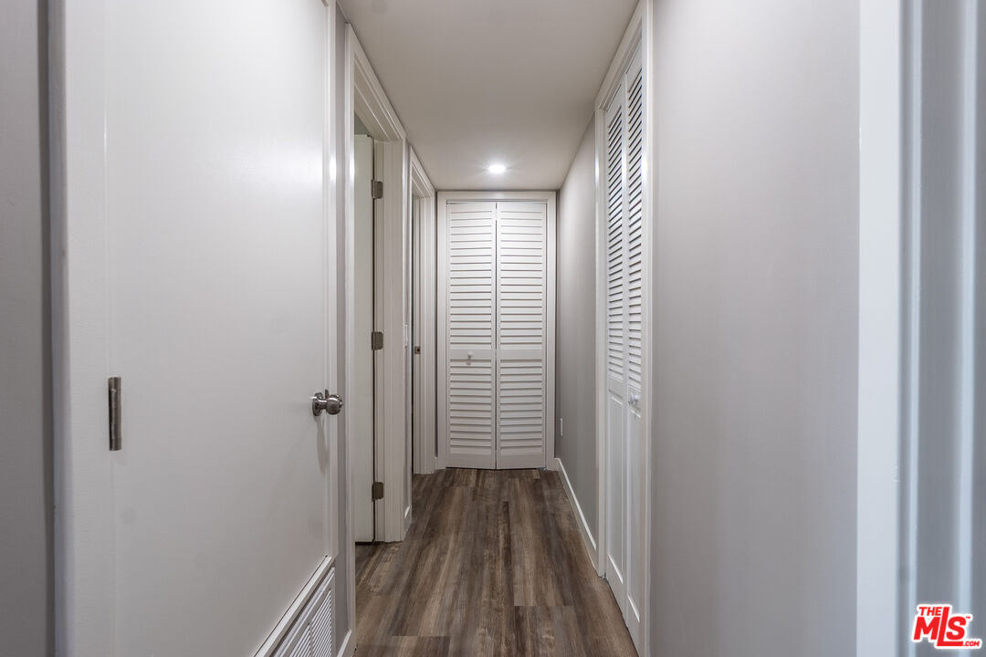 20456 Strathern Street Winnetka, CA 91306 - Photo 37 of 37 a view of hallway with wooden floor