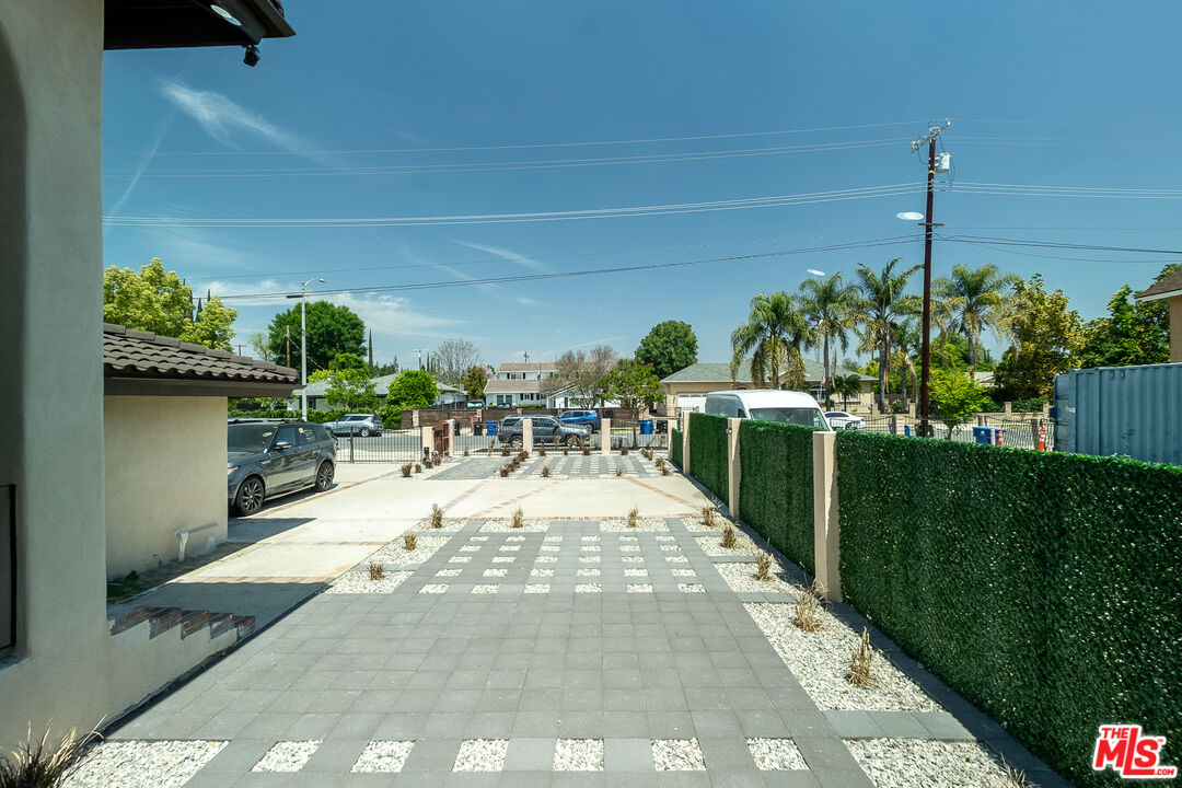 20456 Strathern Street Winnetka, CA 91306 - Photo 4 of 37 a view of a backyard with plants
