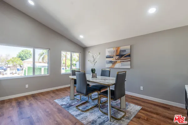 a workspace with furniture and a window