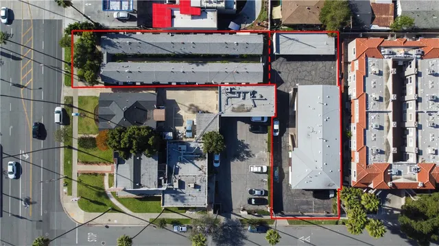 a house that has a tree in front of the house