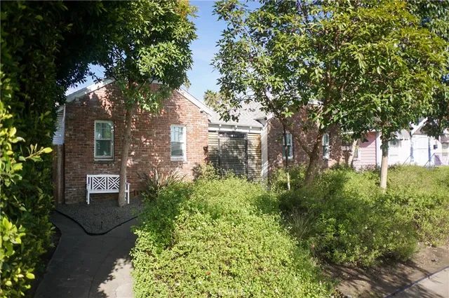 a view of a pathway with house on the balcony