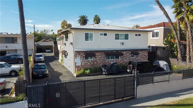 a view of outdoor kitchen and outdoor seating