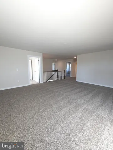 a view of a room that has a window in it