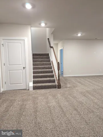 a white bath tub sitting in a bathroom