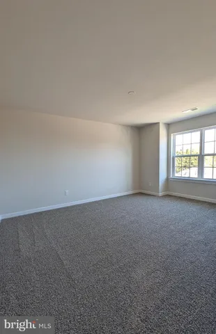 a bathroom with a sink a toilet a mirror and bathtub