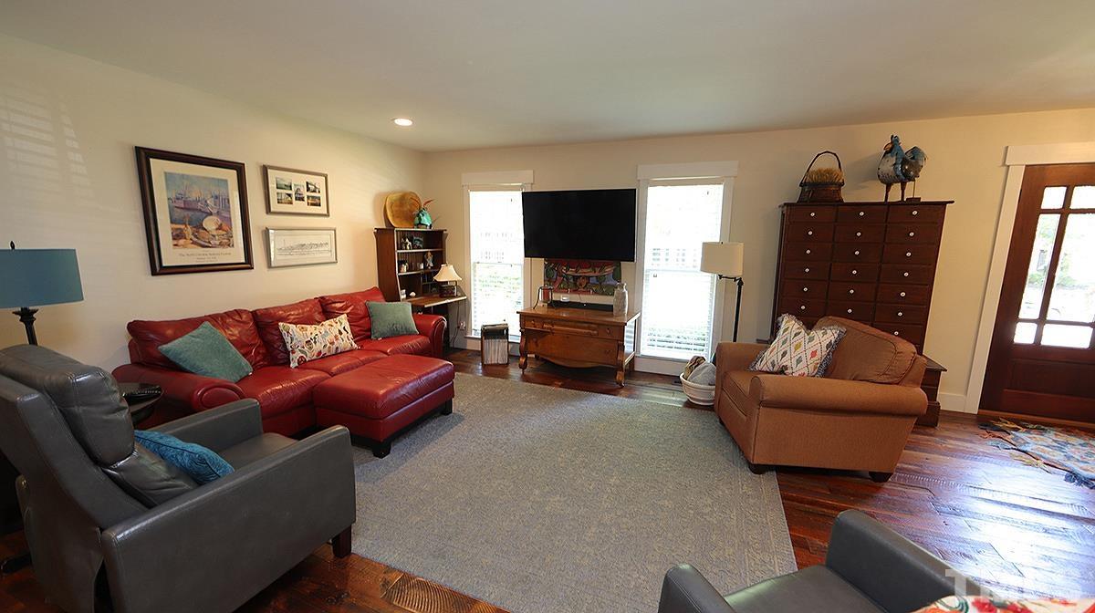2013 Torrington Street Raleigh, NC 27615 - Photo 3 of 22 Casual dining area flows between family room and kitchen.