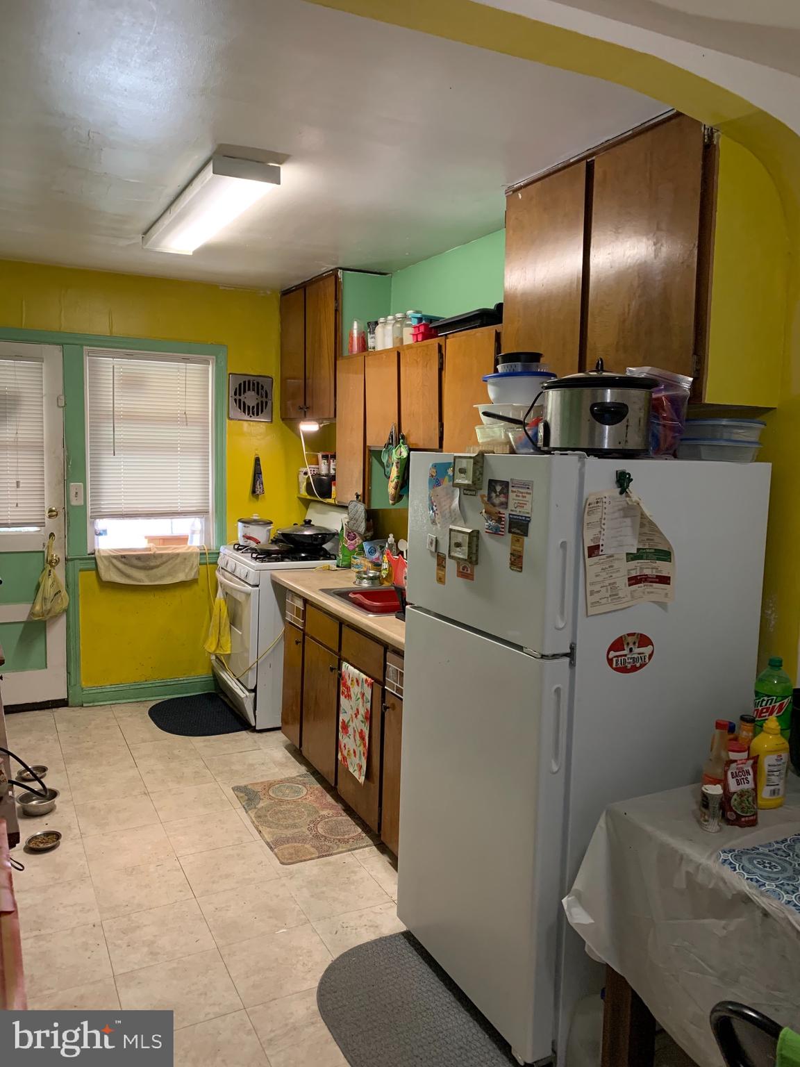 922 Elm Ridge Avenue Baltimore, MD 21229 - Photo 16 of 22 Large kitchen with gas cooking + refrigerator