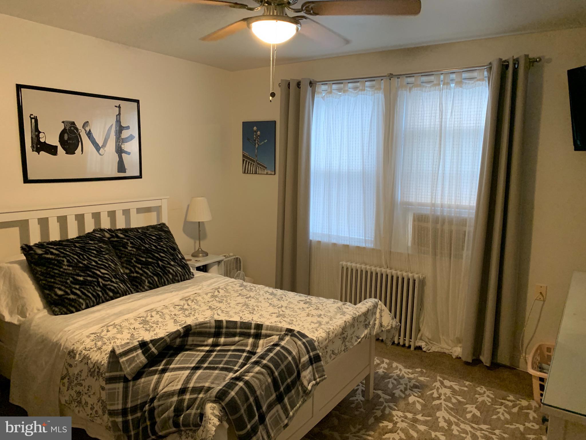 922 Elm Ridge Avenue Baltimore, MD 21229 - Photo 8 of 22 Spacious bedroom with ceiling fan