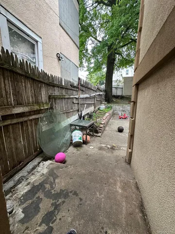 a backyard of a house with seating space