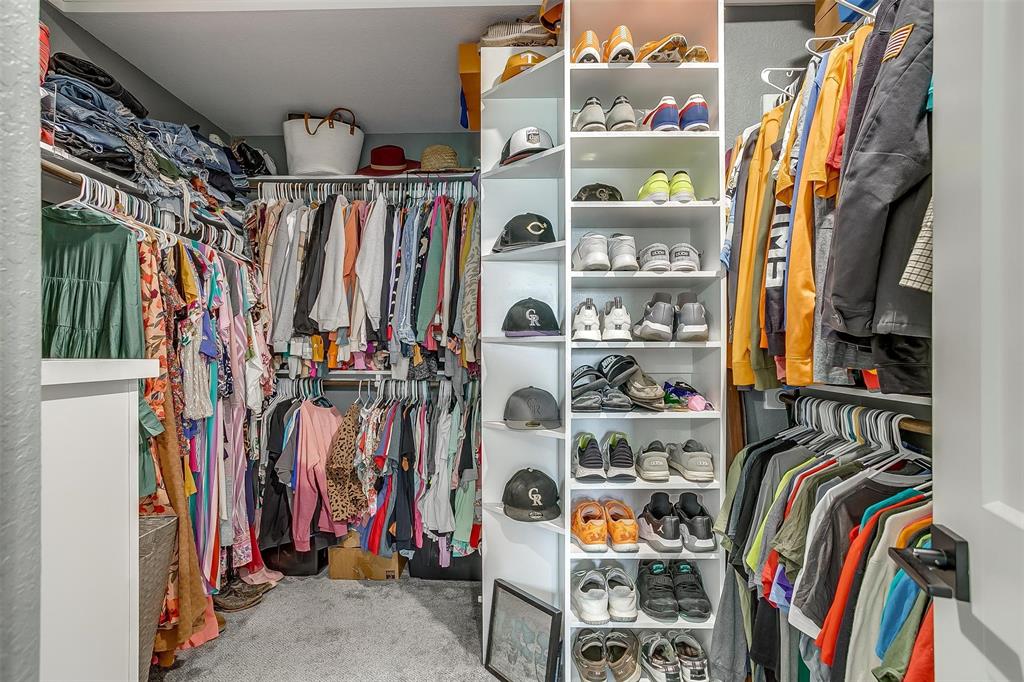 3095 County Road 905 Joshua, TX 76058 - Photo 17 of 38 a view of walk in closet with clothes and shoes