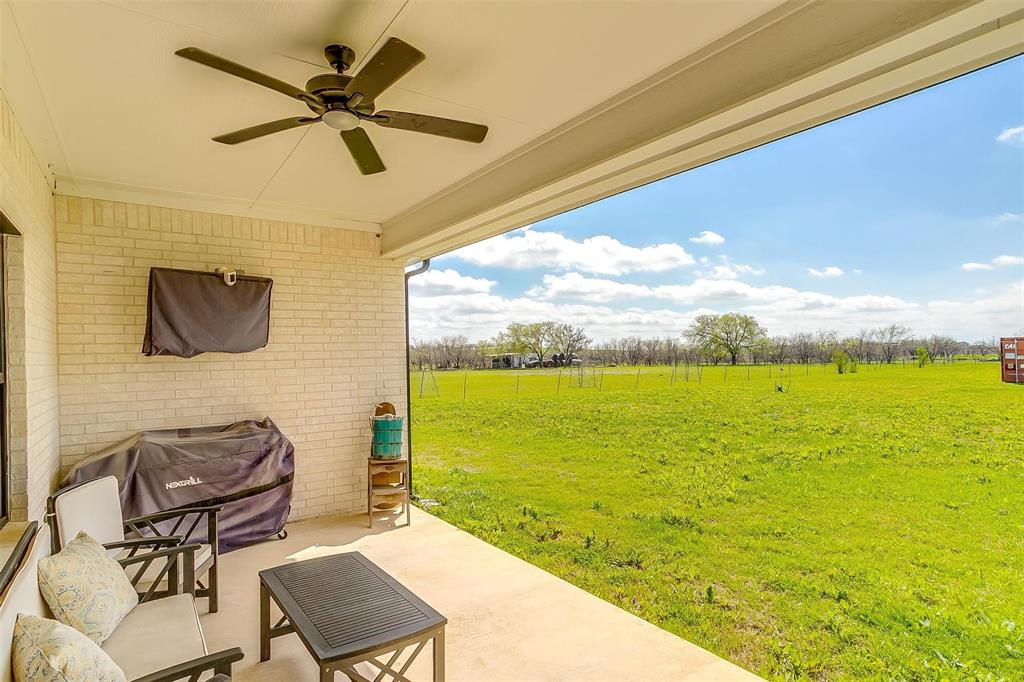 3095 County Road 905 Joshua, TX 76058 - Photo 33 of 38 a view of a living room and floor to ceiling window