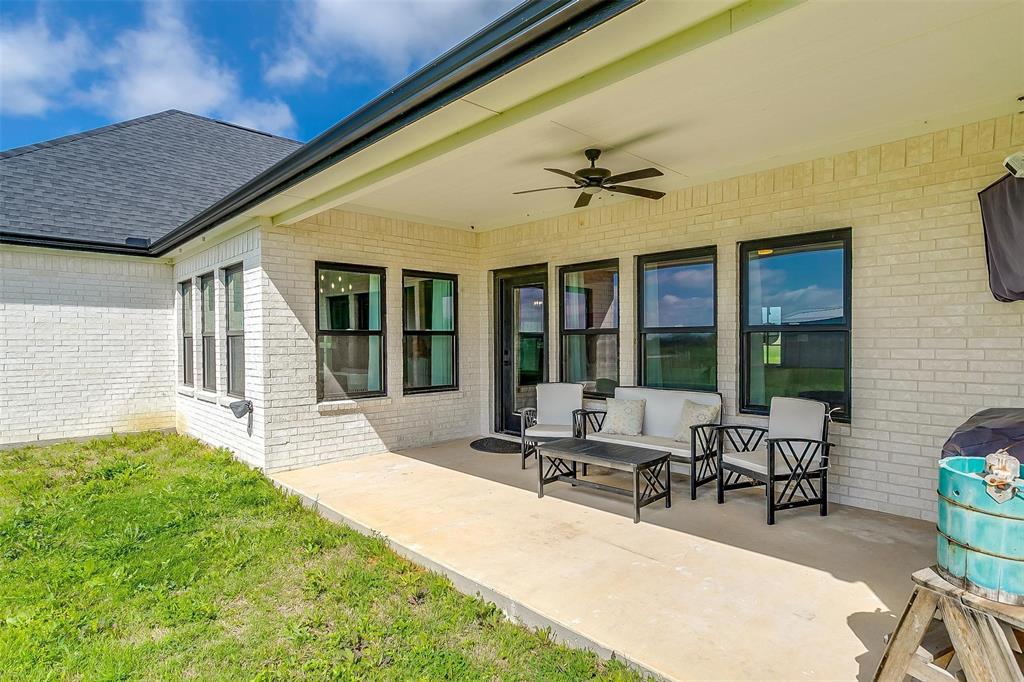 3095 County Road 905 Joshua, TX 76058 - Photo 34 of 38 a building outdoor space with patio furniture and potted plants
