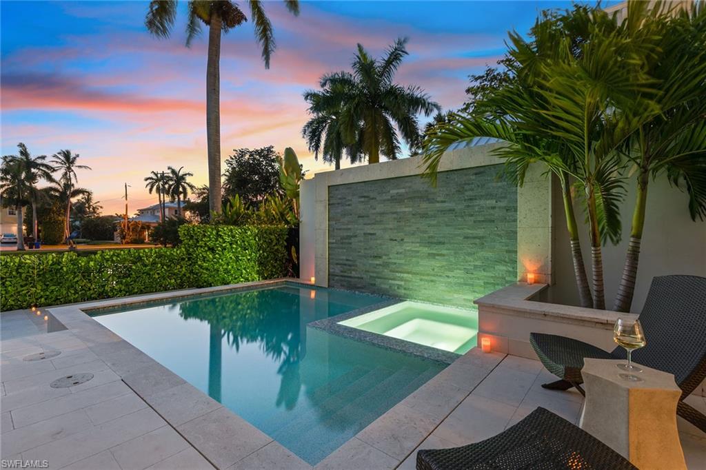 770 Park Street Naples, FL 34102 - Photo 31 of 34 a view of a backyard with a garden