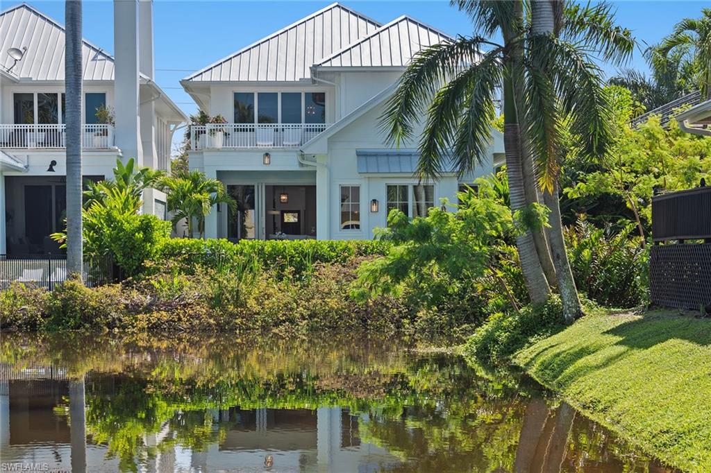 770 Park Street Naples, FL 34102 - Photo 33 of 34 a front view of a house with a yard
