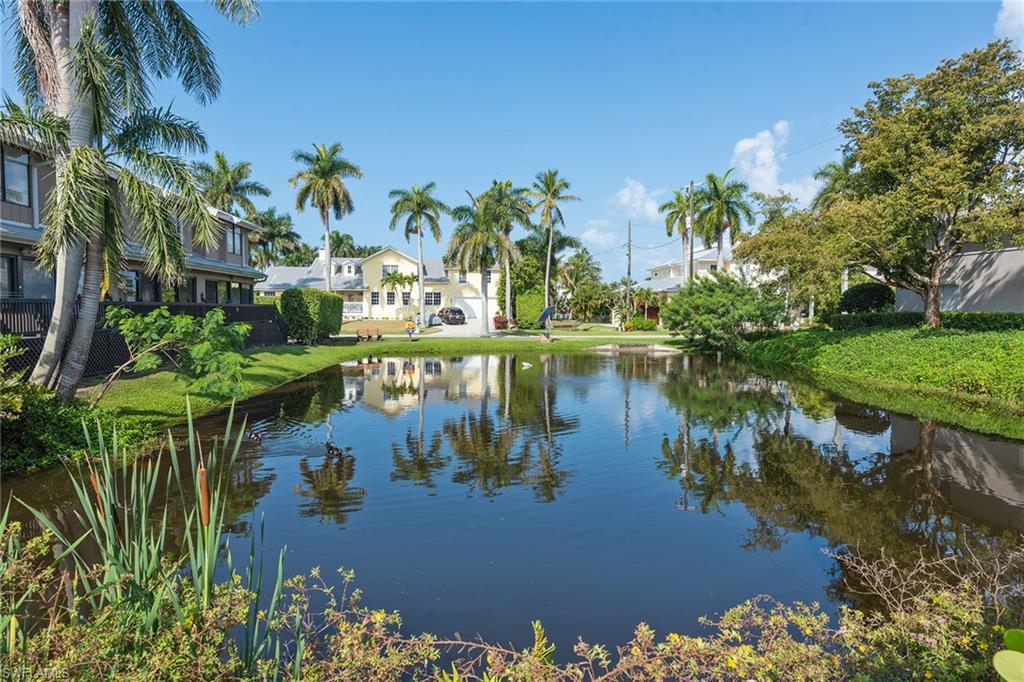 770 Park Street Naples, FL 34102 - Photo 34 of 34 a view of a lake with a lake