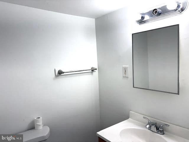 502 South Main Street, Unit B Williamstown, NJ 08094 - Photo 17 of 19 a bathroom with a sink and a mirror