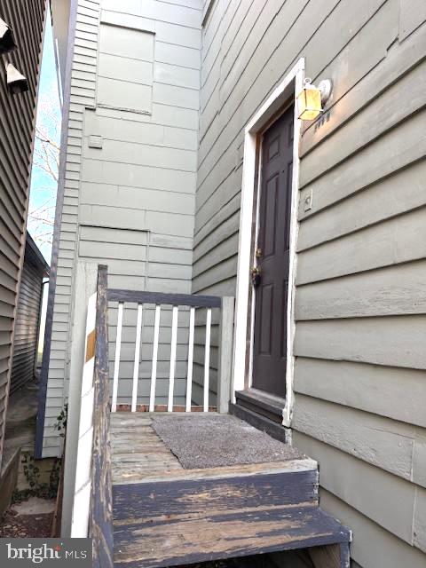 502 South Main Street, Unit B Williamstown, NJ 08094 - Photo 3 of 19 a view of house with wooden door and outdoor seating