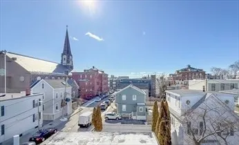 a view of a city with tall buildings