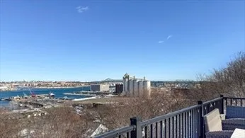 a view of a city skyline from a terrace