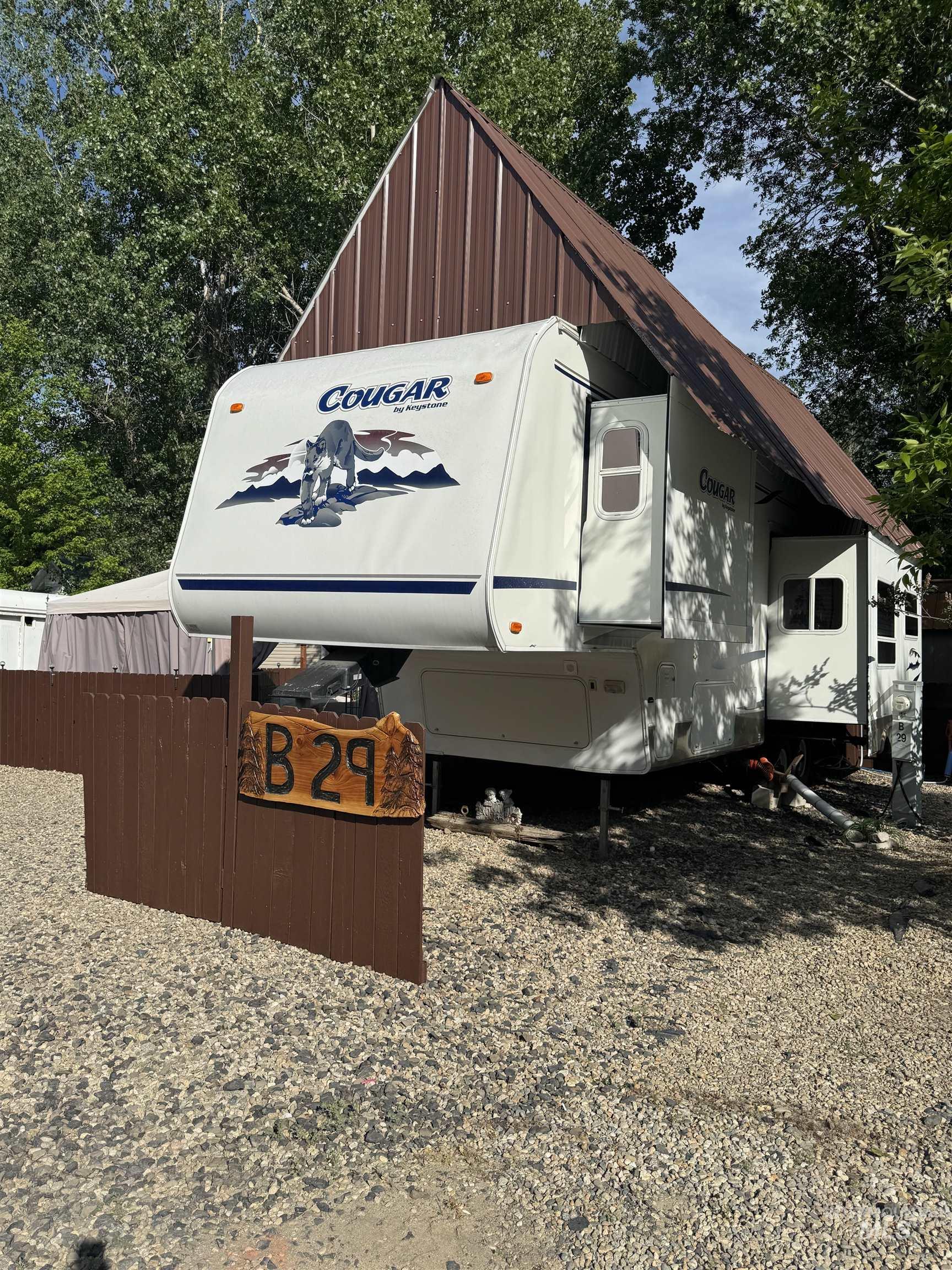 29 B Street Cascade, ID 83611 - Photo 2 of 24 View of side of lot showing sewer and electric connections