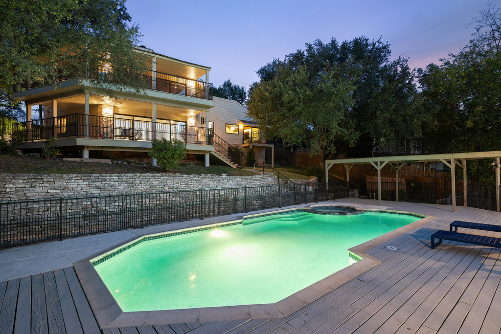 1922 Cypress Point West Austin, TX 78746 - Photo 35 of 38 a view of a swimming pool with a patio