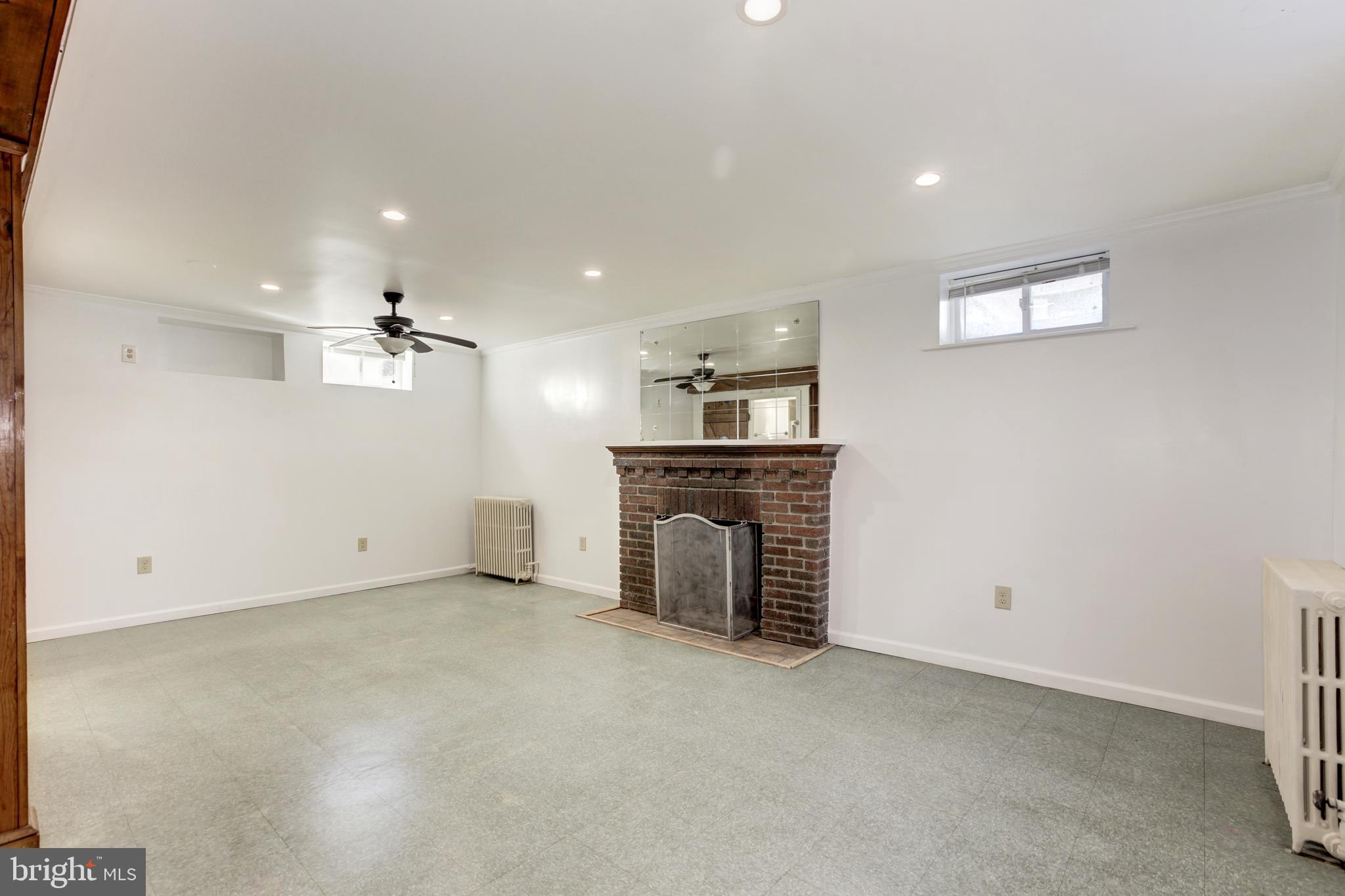 2001 Amherst Road Hyattsville, MD 20783 - Photo 28 of 36 Lower level fireplace
