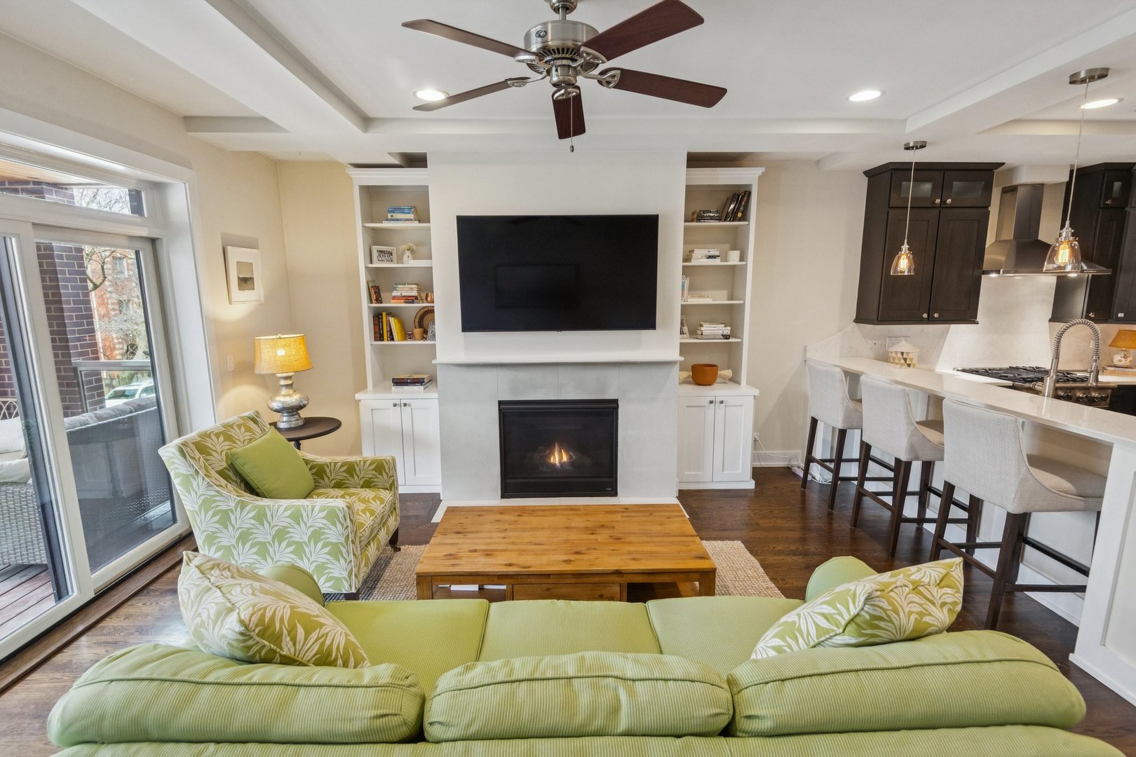 1011 North Wolcott Avenue, Unit 2N Chicago, IL 60622 - Photo 4 of 23 a living room with furniture fireplace and flat screen tv