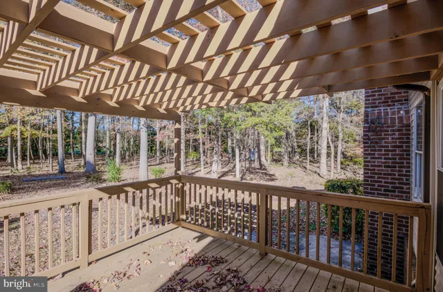 a bathroom with a sink toilet and a mirror