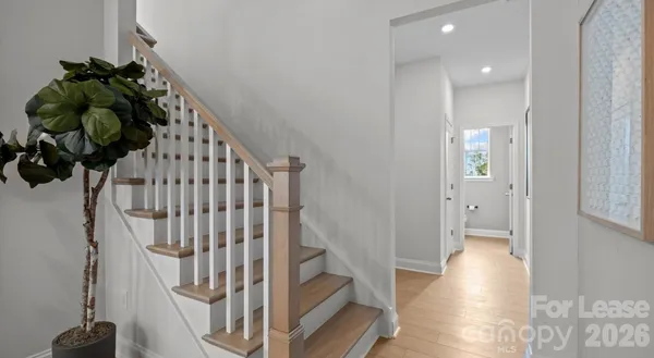 a view of entryway with wooden floor