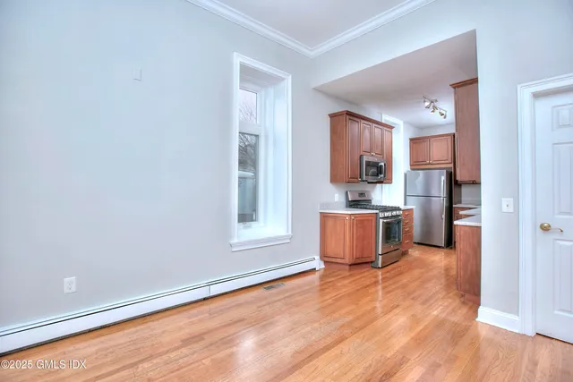 a view of a hallway view with staircase
