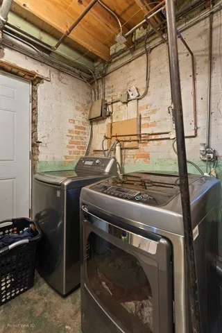 a utility room with a stove and a shower