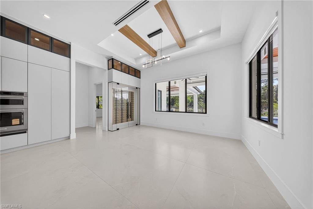 1874 39th Street Southwest Naples, FL 34117 - Photo 11 of 50 a view of an empty room with a window