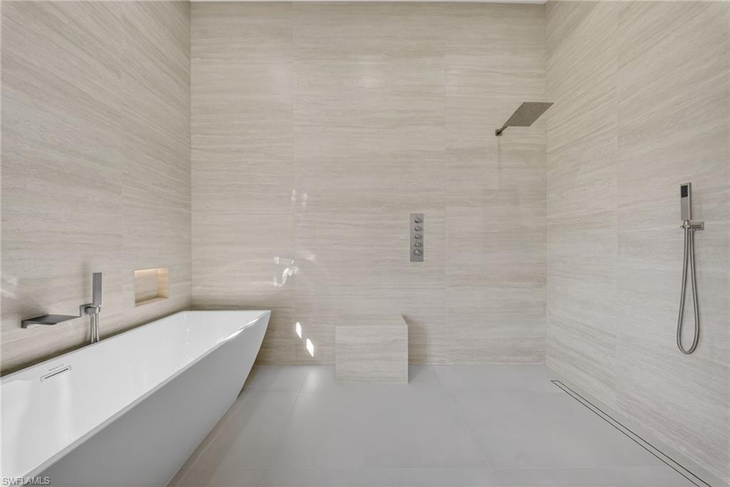 1874 39th Street Southwest Naples, FL 34117 - Photo 21 of 50 a bathroom with a shower and a sink
