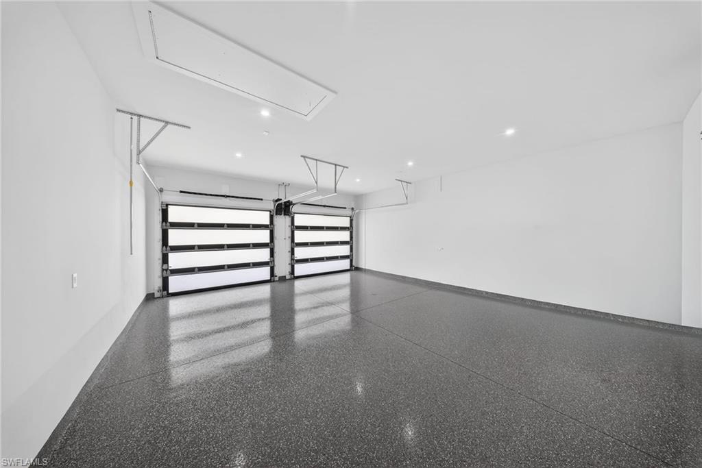 1874 39th Street Southwest Naples, FL 34117 - Photo 24 of 50 a view of empty room with stairs and fan
